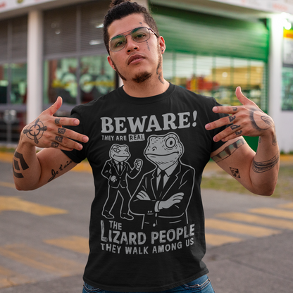 This “Beware! Lizard People” tee turns a classic conspiracy wink into wearable humor. The suited-up reptilian characters strike a bold, comic-book stance that adds a playful sense of intrigue to your outfit. Crisp line art and a vintage poster feel make it a standout for sci-fi lovers, meme collectors, and anyone who enjoys a touch of tongue-in-cheek absurdity. It’s the perfect shirt for sparking conversations and raising eyebrows in all the right ways.