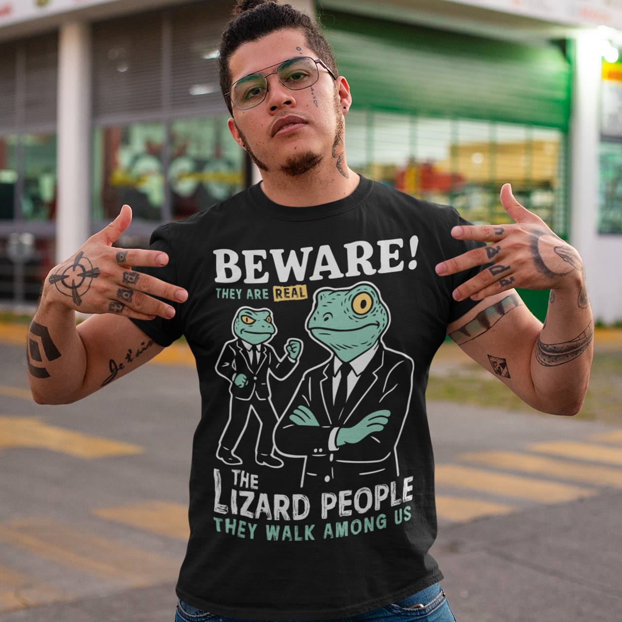 This “Beware! Lizard People” tee turns a classic conspiracy wink into wearable humor. The suited-up reptilian characters strike a bold, comic-book stance that adds a playful sense of intrigue to your outfit. Crisp line art and a vintage poster feel make it a standout for sci-fi lovers, meme collectors, and anyone who enjoys a touch of tongue-in-cheek absurdity. It’s the perfect shirt for sparking conversations and raising eyebrows in all the right ways.