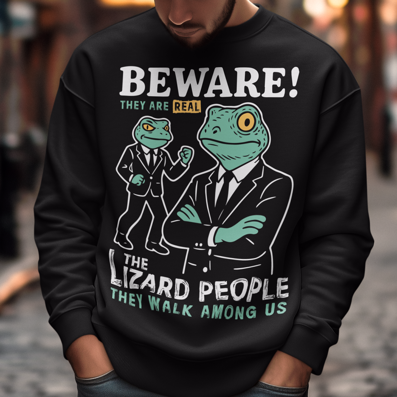 This “Beware! Lizard People” sweatshirt turns a classic conspiracy wink into wearable humor. The suited-up reptilian characters strike a bold, comic-book stance that adds a playful sense of intrigue to your outfit. Crisp line art and a vintage poster feel make it a standout for sci-fi lovers, meme collectors, and anyone who enjoys a touch of tongue-in-cheek absurdity. It’s the perfect shirt for sparking conversations and raising eyebrows in all the right ways.