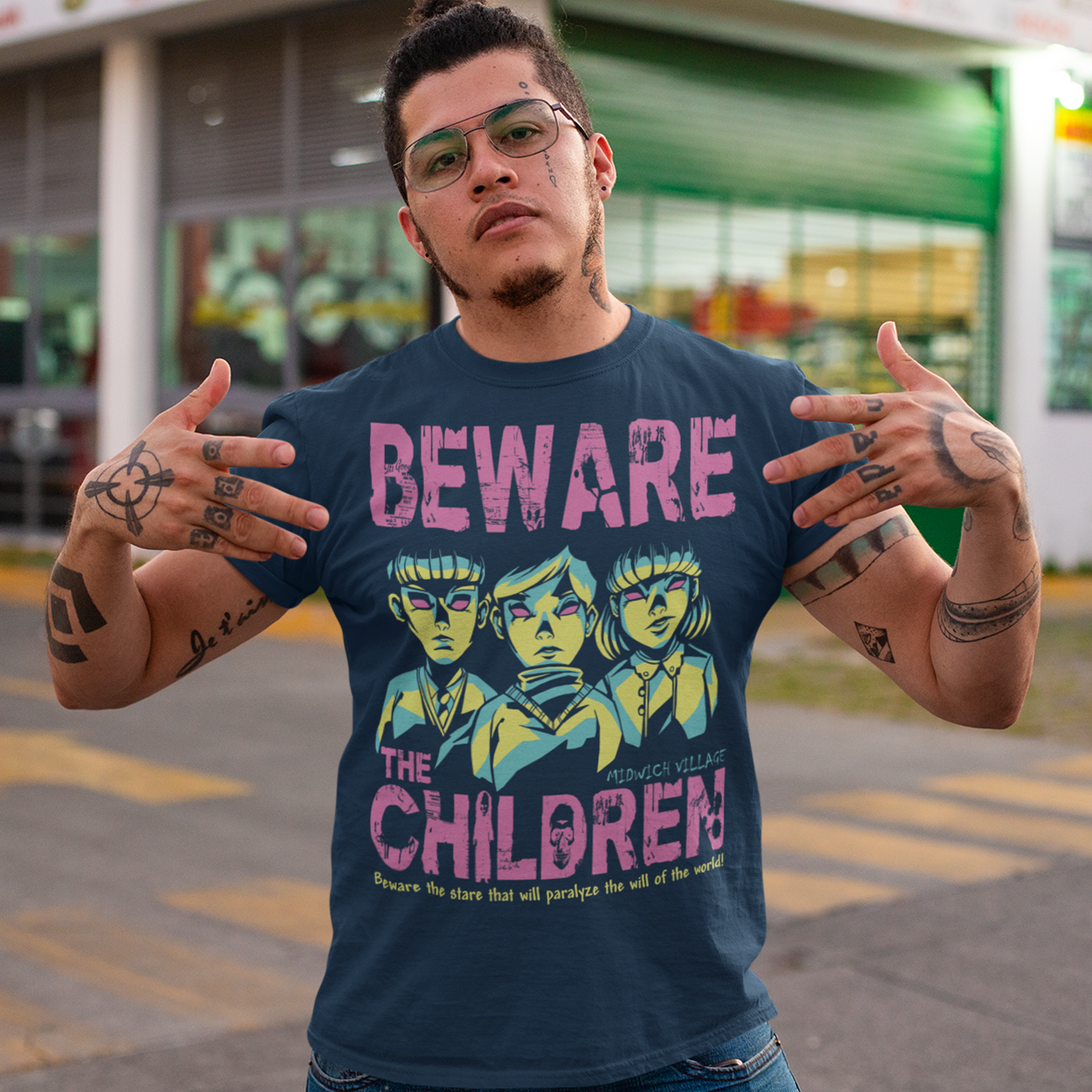 Navy t-shirt of telepathic kids from the Midwich Cuckoos and text "BEWARE THE CHILDREN."