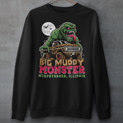 Black sweatshirt of the Murphysboro Mud Monster attacking a truck with text "BIG MUDDY MONSTER".