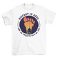 White t-shirt with a bigfoot silhouette on a sunset foot with text "BIGFOOT IS REAL AND HE TRIED TO KICK MY ASS".