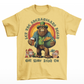 St Patrick's Day yellow t-shirt of a Bigfoot dressed as a leprechaun holding a beer and a pot of gold with text above LET THE SHENANIGANS BEGIN.