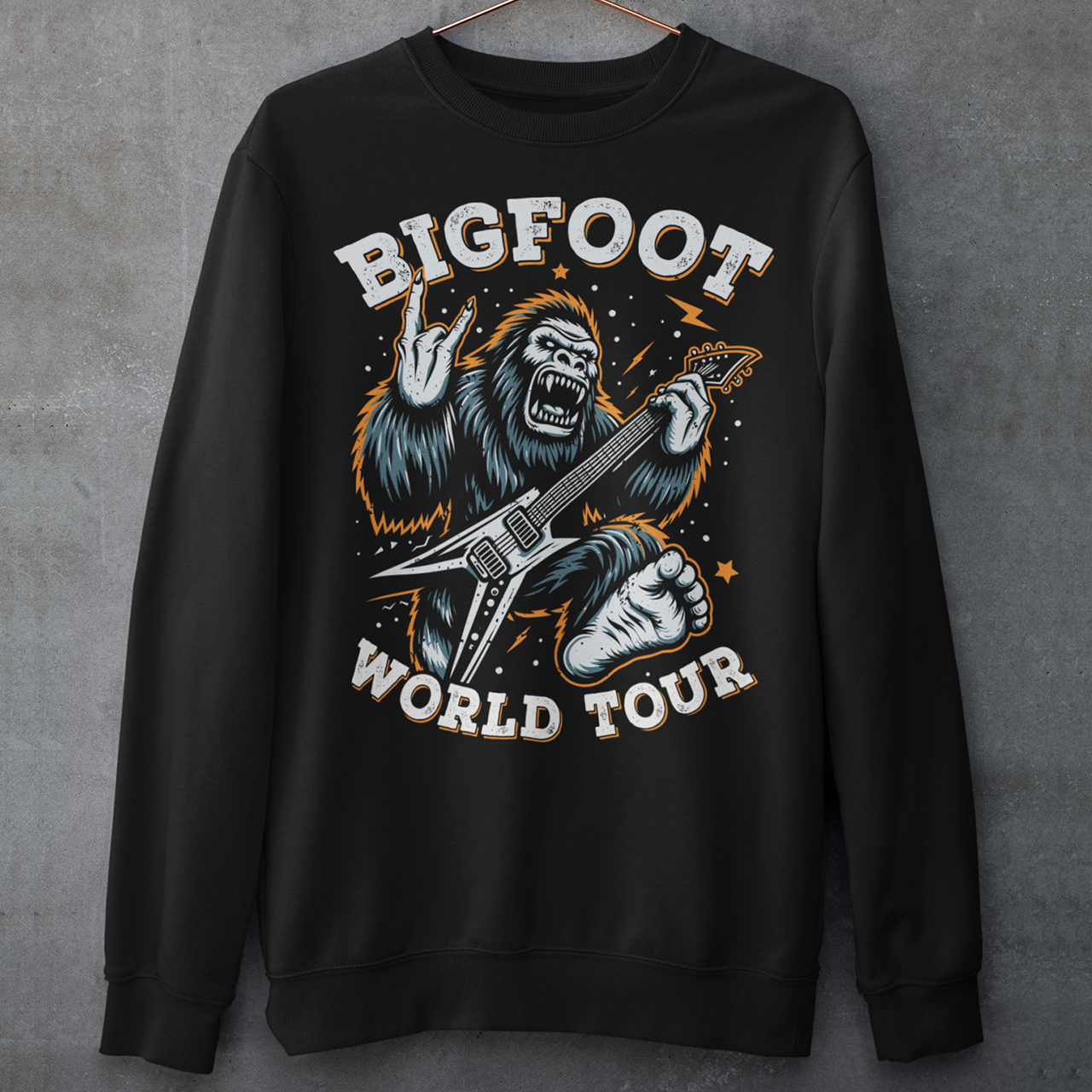 Black sweatshirt of Bigfoot playing an electric guitar with text BIGFOOT WORLD TOUR.