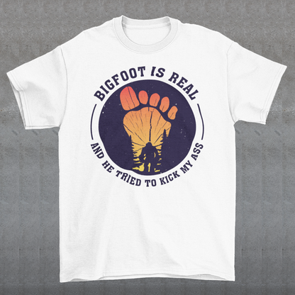 Step into the world of mysterious legends and untamed wilderness with our captivating t-shirt design featuring the legendary creature himself: Bigfoot. Against a breathtaking sunset backdrop, this design encapsulates the thrilling encounter between man and myth. At the center of the design, a striking depiction of Bigfoot takes the spotlight, his towering figure emerging from the dense forest the creature's shaggy fur and muscular frame evoke an air of primal strength and enigma.