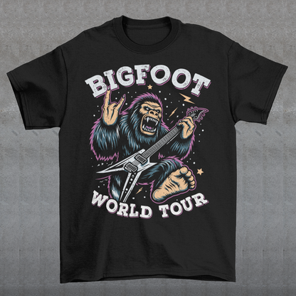 Introducing the ultimate t-shirt for cryptid enthusiasts and music lovers alike! This vibrant design features the legendary Bigfoot, rocking out on an electric guitar with unparalleled style and energy. Bigfoot, depicted in dynamic detail, stands mid-riff, his shaggy fur flying as he strums the guitar with electrifying intensity. Around this striking image, bold text proudly declares "BIGFOOT WORLD TOUR."