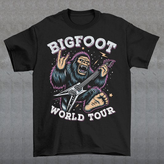 Introducing the ultimate t-shirt for cryptid enthusiasts and music lovers alike! This vibrant design features the legendary Bigfoot, rocking out on an electric guitar with unparalleled style and energy. Bigfoot, depicted in dynamic detail, stands mid-riff, his shaggy fur flying as he strums the guitar with electrifying intensity. Around this striking image, bold text proudly declares "BIGFOOT WORLD TOUR."