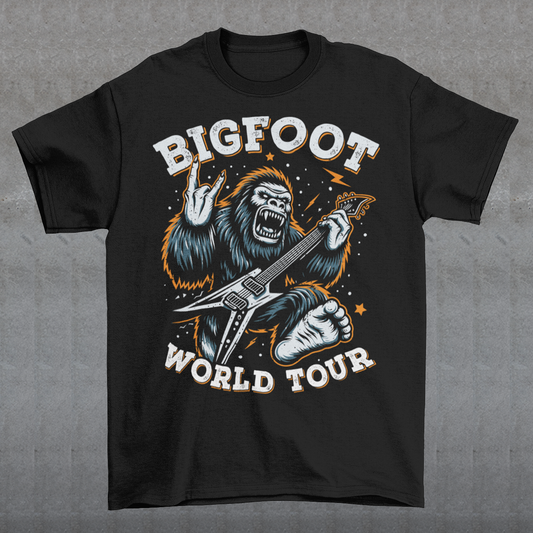 Introducing the ultimate t-shirt for cryptid enthusiasts and music lovers alike! This vibrant design features the legendary Bigfoot, rocking out on an electric guitar with unparalleled style and energy. Bigfoot, depicted in dynamic detail, stands mid-riff, his shaggy fur flying as he strums the guitar with electrifying intensity. Around this striking image, bold text proudly declares "BIGFOOT WORLD TOUR."