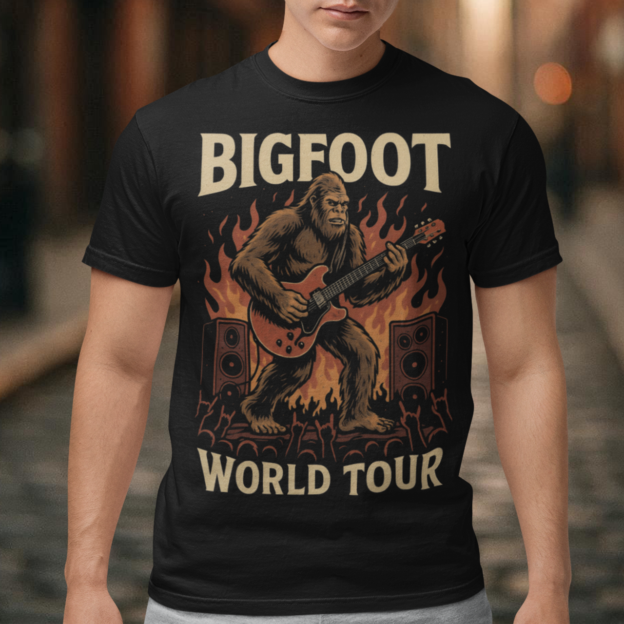 Introducing the ultimate t-shirt for cryptid enthusiasts and music lovers alike! This vibrant design features the legendary Bigfoot, rocking out on an electric guitar with unparalleled style and energy. Bigfoot, depicted in dynamic detail, stands mid-riff, his shaggy fur flying as he strums the guitar with electrifying intensity.