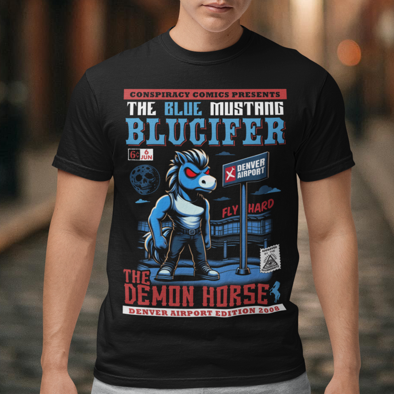 Unleash the legend with this bold t-shirt featuring Blucifer, the infamous blue mustang brought to life in a striking comic book design! This vibrant illustration showcases the menacing yet captivating spirit of Blucifer, complete with glowing red eyes and dynamic comic-style shading. The design is set against a dramatic backdrop of Denver Airport emphasizing Blucifer's larger-than-life presence. Perfect for fans of myth, art, and Denver’s most iconic (and controversial) sculpture.