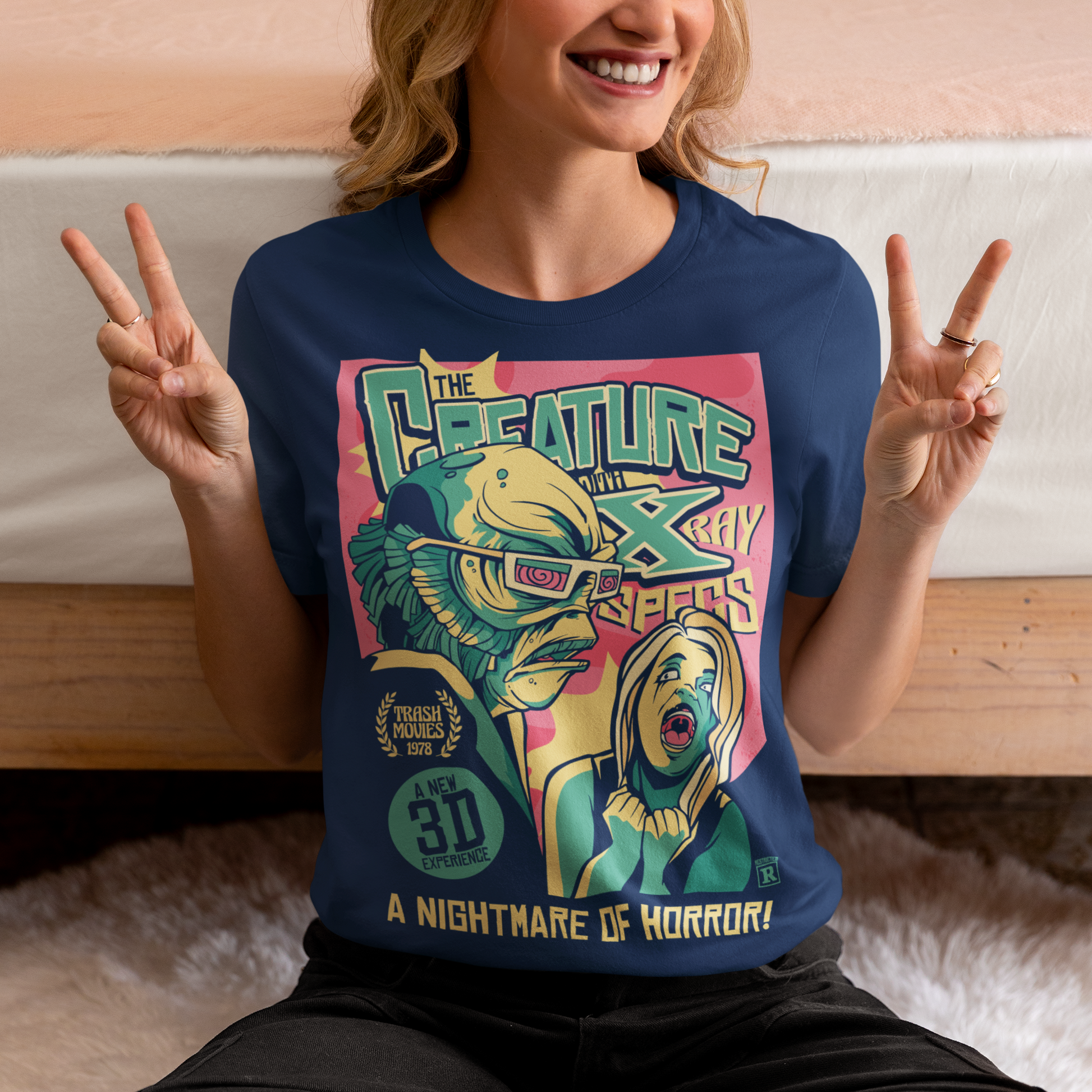 Unleash the monster within with this bold and striking Creature from the Black Lagoon comic book design. Featuring the iconic creature emerging from the depths of the murky lagoon, this t-shirt is a must-have for any fan of classic horror movies and graphic novels. The comic book artwork captures every terrifying detail of the creature's scaly skin and piercing eyes, making it a truly spine-chilling addition to your wardrobe.