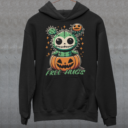 Black Halloween hoodie of a cactus teddy in a pumpkin with text underneath "FREE HUGS."