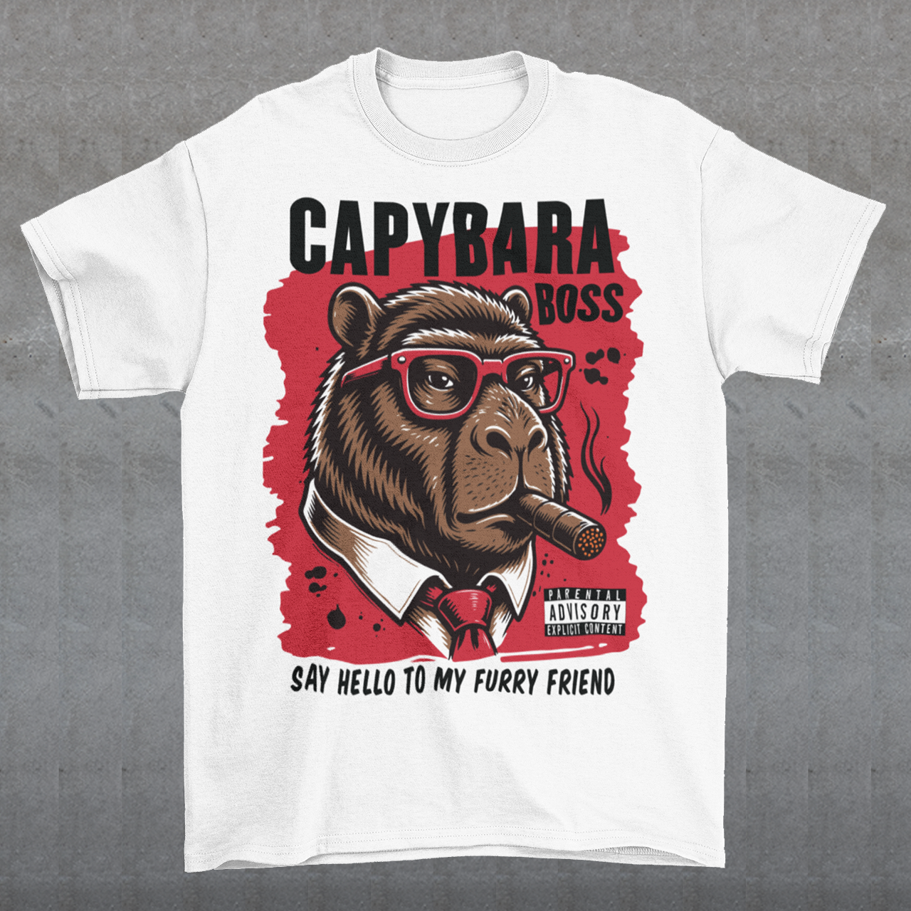 White t-shirt featuring a bold vintage-style capybara graphic wearing red sunglasses, a suit and tie, and smoking a cigar. The design includes “CAPYBARA BOSS” text, a red background, and the phrase “SAY HELLO TO MY FURRY FRIEND,” creating a funny gangster-inspired animal design for capybara lovers and meme fans.