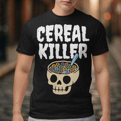 Black t-shirt featuring the phrase “Cereal Killer” in large distressed white letters above a cartoon skull used as a cereal bowl filled with colorful cereal loops and a spoon. Funny dark humor design combining spooky Halloween style with breakfast pun humor.