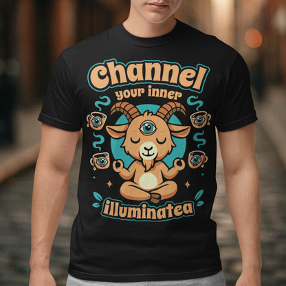 Black t-shirt featuring a humorous occult-inspired design with the text “Channel Your Inner Illuminatea.” The artwork shows a meditating goat with a third eye, crossed legs, and raised hands, surrounded by floating teacups decorated with all-seeing eyes. Teal and tan accents create a mystical aesthetic blending spiritual symbolism, conspiracy humor, meditation themes, and playful occult artwork. Perfect for fans of witchy, esoteric, and funny graphic tees.