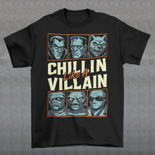 Black t-shirt featuring the phrase "Chillin Like A Villain" with six classic horror monster portraits, including a vampire, Frankenstein's monster, werewolf, mummy, swamp creature, and the Invisible Man. The retro-inspired graphic uses distressed vintage styling with bold cream and orange lettering, making it a fun horror-themed shirt for Halloween, monster movie fans, goth fashion lovers, and classic horror enthusiasts.