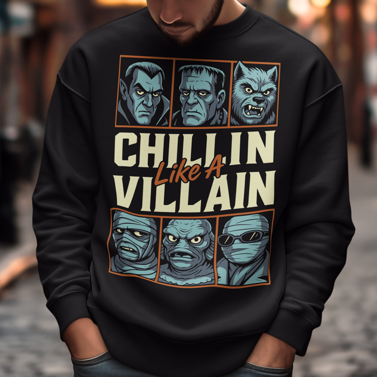Black sweatshirt featuring the phrase "Chillin Like A Villain" with six classic horror monster portraits, including a vampire, Frankenstein's monster, werewolf, mummy, swamp creature, and the Invisible Man. The retro-inspired graphic uses distressed vintage styling with bold cream and orange lettering, making it a fun horror-themed shirt for Halloween, monster movie fans, goth fashion lovers, and classic horror enthusiasts.