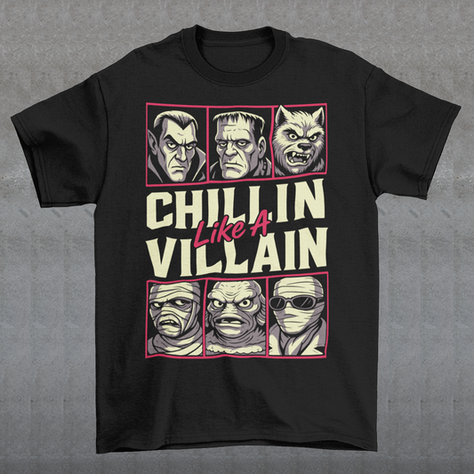 Black t-shirt featuring the phrase "Chillin Like A Villain" with six classic horror monster portraits, including a vampire, Frankenstein's monster, werewolf, mummy, swamp creature, and the Invisible Man. The retro-inspired graphic uses distressed vintage styling with bold cream and pink lettering, making it a fun horror-themed shirt for Halloween, monster movie fans, goth fashion lovers, and classic horror enthusiasts.
