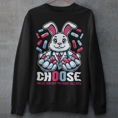 Black sweatshirt of a white rabbit holding blue and red pills with text underneath CHOOSE AND SEE HOW DEEP THE RABBIT HOLE GOES.