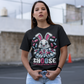 Black t-shirt of a white rabbit holding blue and red pills with text underneath CHOOSE AND SEE HOW DEEP THE RABBIT HOLE GOES.