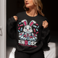 Black sweatshirt of a white rabbit holding blue and red pills with text underneath CHOOSE AND SEE HOW DEEP THE RABBIT HOLE GOES.