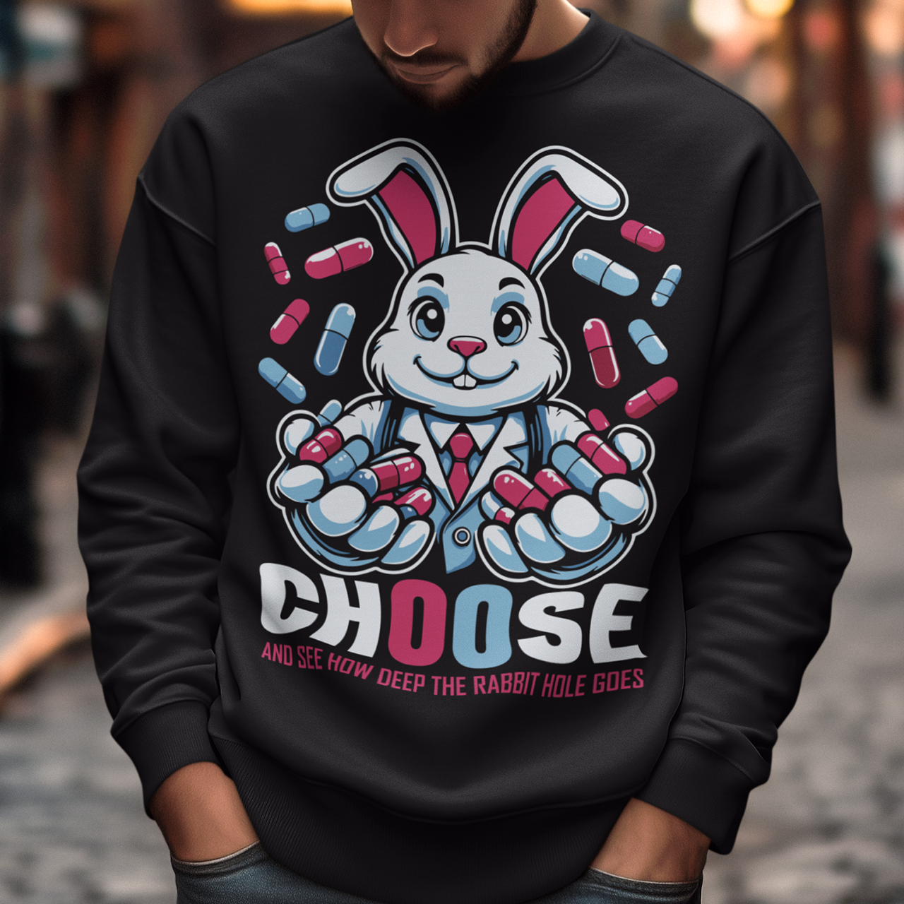 Embrace the enigmatic allure of the unknown with our captivating sweatshirt design featuring a white rabbit holding contrasting blue and red pills. This imagery beckons you to ponder the choices that define your journey. Beneath the striking illustration, bold text reads: "CHOOSE AND SEE HOW DEEP THE RABBIT HOLE GOES," inviting wearers to contemplate the consequences of their decisions and embark on a quest for truth, discovery, and self-awareness.