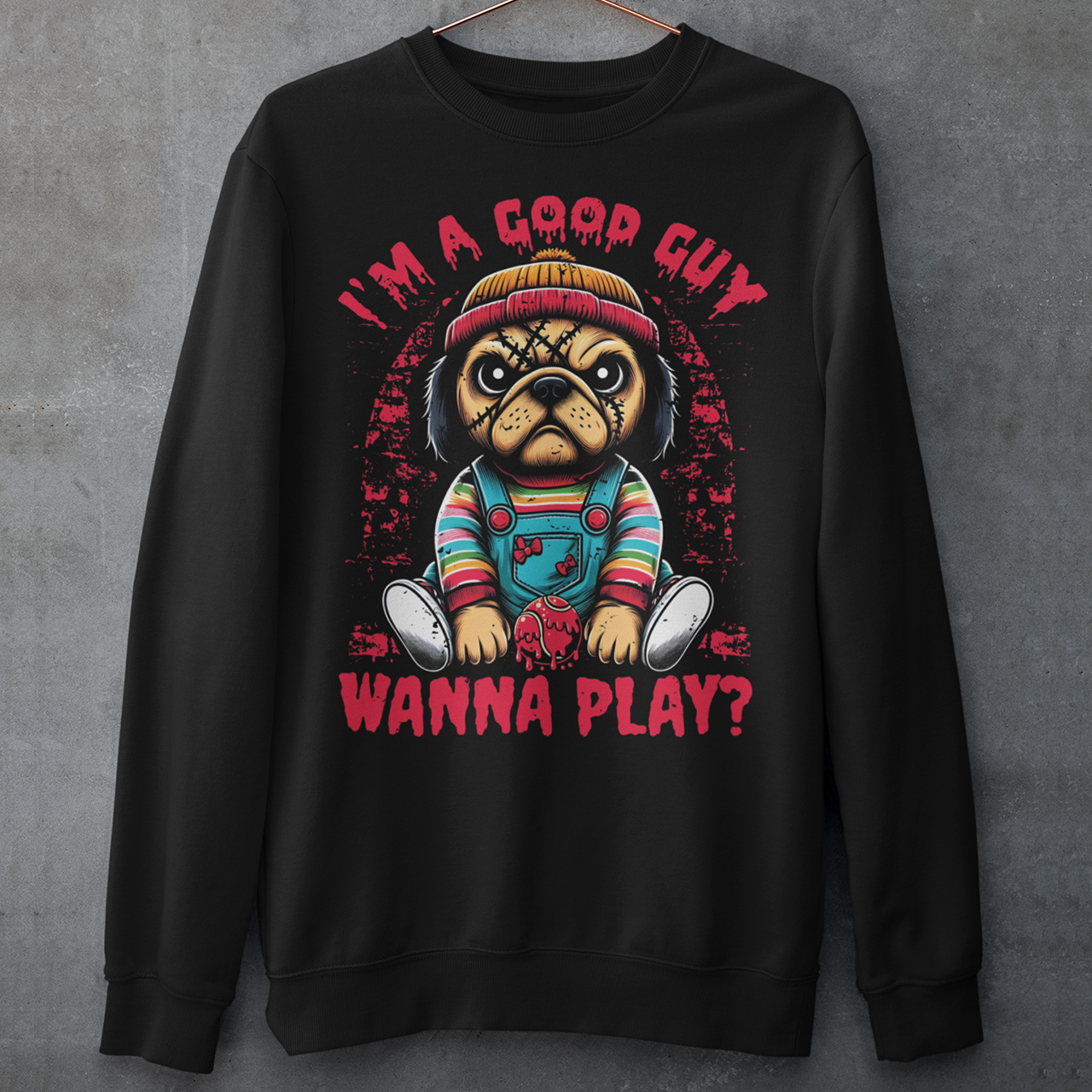 Black sweatshirt of a Chucky Pug with text above "I'M A GOOD GUY". Text below WANNA PLAY?
