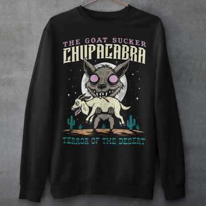 Black sweatshirt of a chupacabra sucking on a goat in the desert with text above THE GOAT SUCKER CHUPACABRA ang text below TERROR OF THE DESERT.