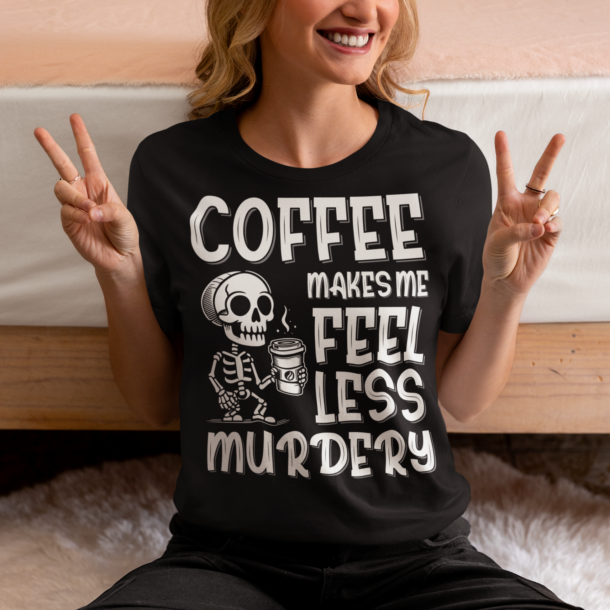 Introducing our "Coffee Makes Me Feel Less Murdery" T-Shirt – the perfect blend of dark humor and everyday caffeine dependence. This unique design features a laid-back skeleton holding a steaming cup of coffee, perfectly capturing the sentiment that a good brew can make even the most undead feel more alive. The bold text "COFFEE MAKES ME FEEL LESS MURDERY" adds a cheeky twist, making this shirt a must-have for coffee lovers with a quirky sense of humor.