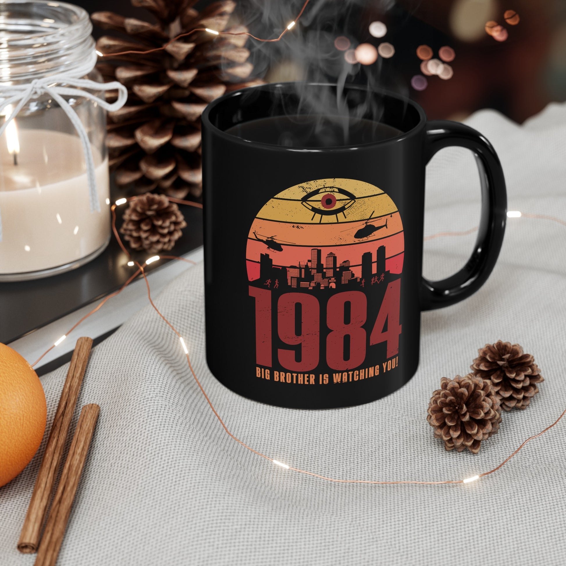 Black mug of a dystopian city silhouette on a retro sun with text 1984 BIG BROTHER IS WATCHING YOU!