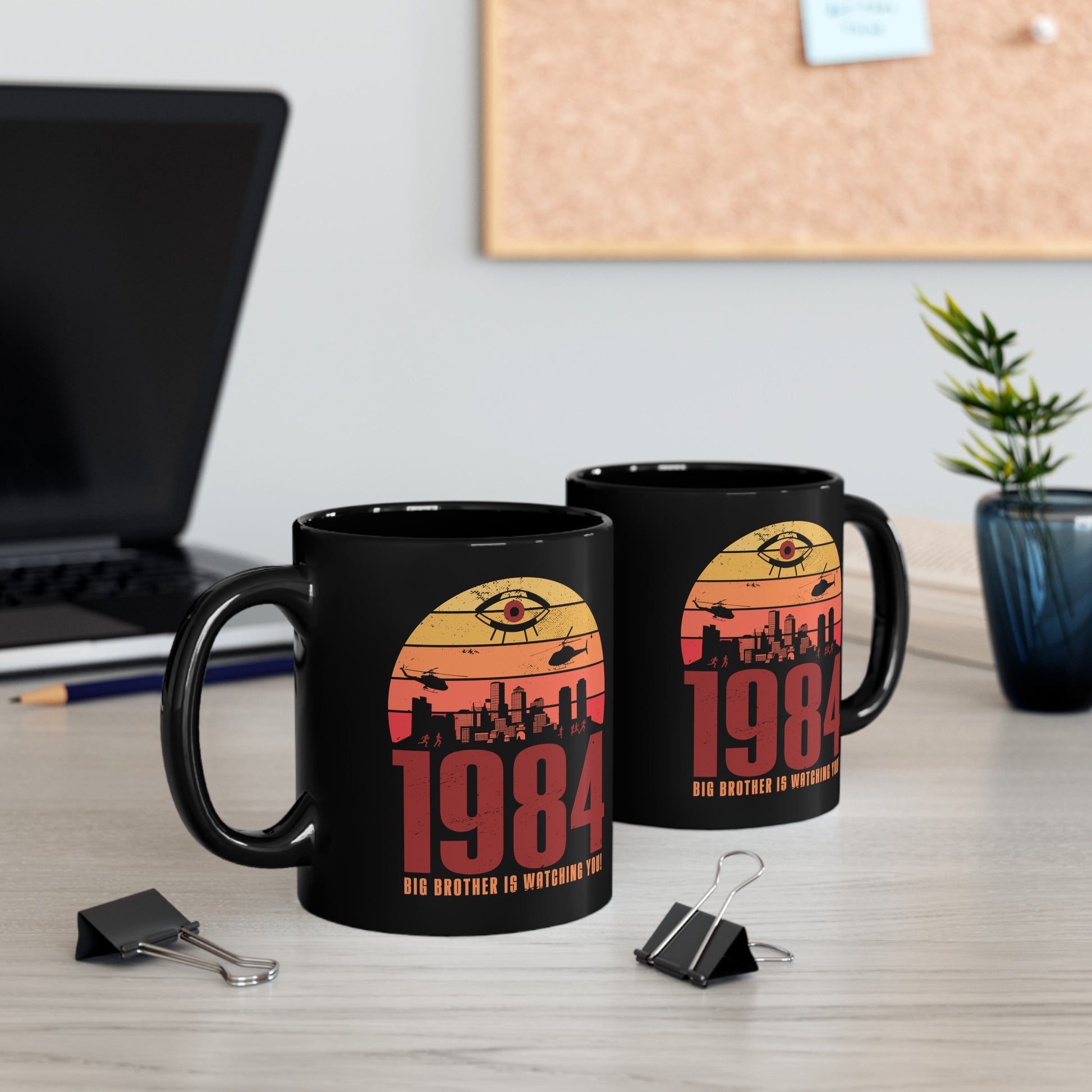 Black mug of a dystopian city silhouette on a retro sun with text 1984 BIG BROTHER IS WATCHING YOU!