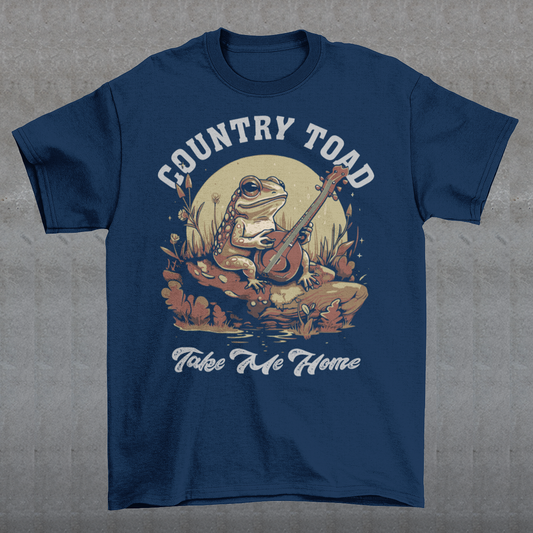 Introducing our delightful "Country Toad Take Me Home" t-shirt, where whimsy and charm come together in perfect harmony. This enchanting design captures the essence of a peaceful evening in the countryside, transporting you to a world where nature and music blend seamlessly. At the center of the design, you'll find a vibrant depiction of a serene pond illuminated by the gentle glow of the moon. Resting on a moss-covered rock, a plucky frog musician steals the show as it strums a banjo.