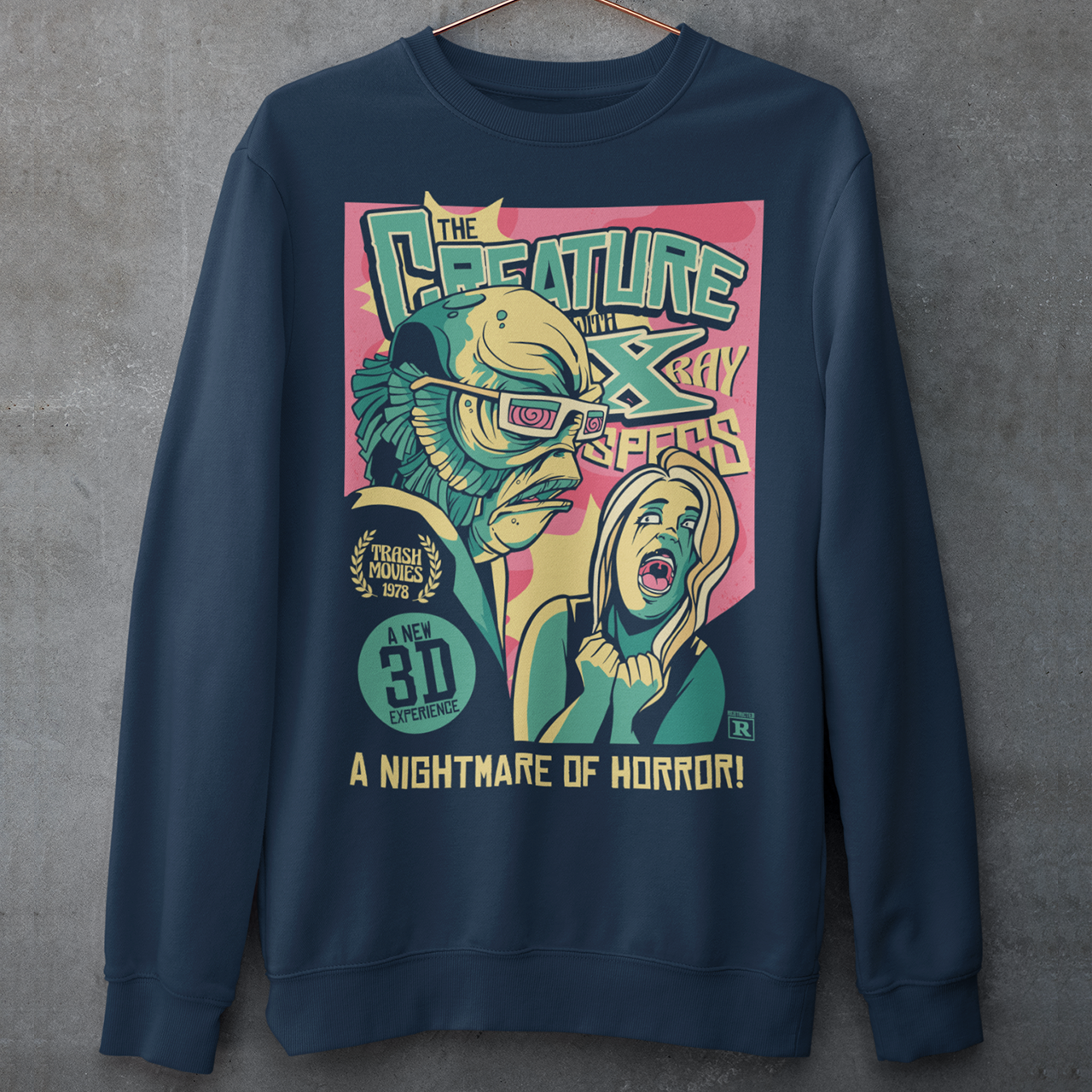 Navy sweatshirt of the creature of the black lagoon comic book.