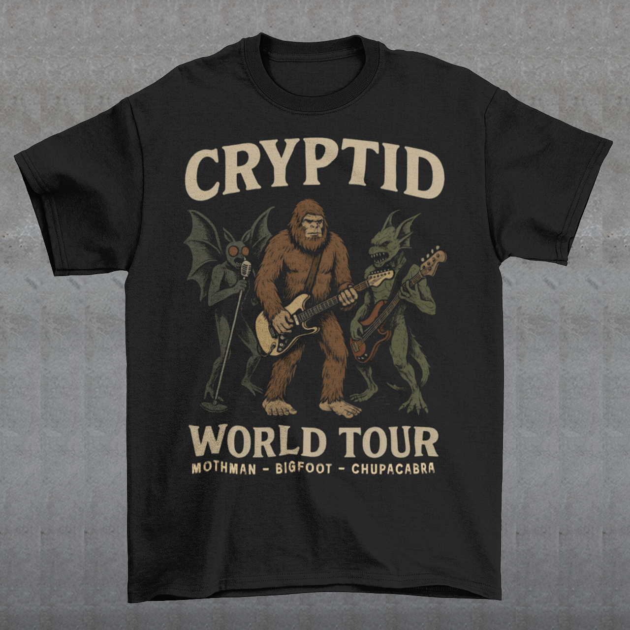 Rock out with legends from beyond the myths! This bold graphic tee features Mothman, Bigfoot, and the Chupacabra shredding as a rock band, headlining the CRYPTID WORLD TOUR. With vintage concert-poster vibes, it’s the perfect blend of spooky lore and rock ’n’ roll energy.