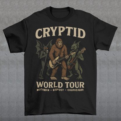 Rock out with legends from beyond the myths! This bold graphic tee features Mothman, Bigfoot, and the Chupacabra shredding as a rock band, headlining the CRYPTID WORLD TOUR. With vintage concert-poster vibes, it’s the perfect blend of spooky lore and rock ’n’ roll energy.