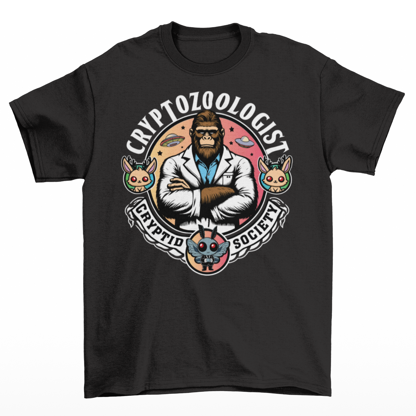 Black t-shirt of a Bigfoot scientist with UFOs in the background. Mothman underneath and text above CRYPTOZOOLOGIST.