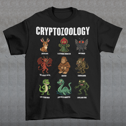 This black graphic tee celebrates the strange and wonderful world of cryptozoology with a lineup of iconic cryptids, each illustrated in a playful, cartoon style. From Bigfoot and Mothman to the Loch Ness Monster, Chupacabra, and Jersey Devil, the design reads like a greatest-hits roster of legendary creatures that lurk just beyond the edge of belief. Bold “Cryptozoology” lettering tops the grid, giving it the feel of a vintage science chart with a fun, modern twist.