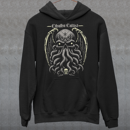 Unleash your dark allegiance with this bold graphic tee featuring a haunting skull-faced Cthulhu design. Tentacles twist and coil beneath a menacing skeletal visage, merging death and madness in one unforgettable image. Above the ancient cosmic horror, the words “Cthulhu Cultist” loom in eldritch-style lettering, marking you as a devoted follower of the Great Old One. Perfect for fans of Lovecraftian horror, dark fantasy, or anyone drawn to the mysterious depths of the unknown.