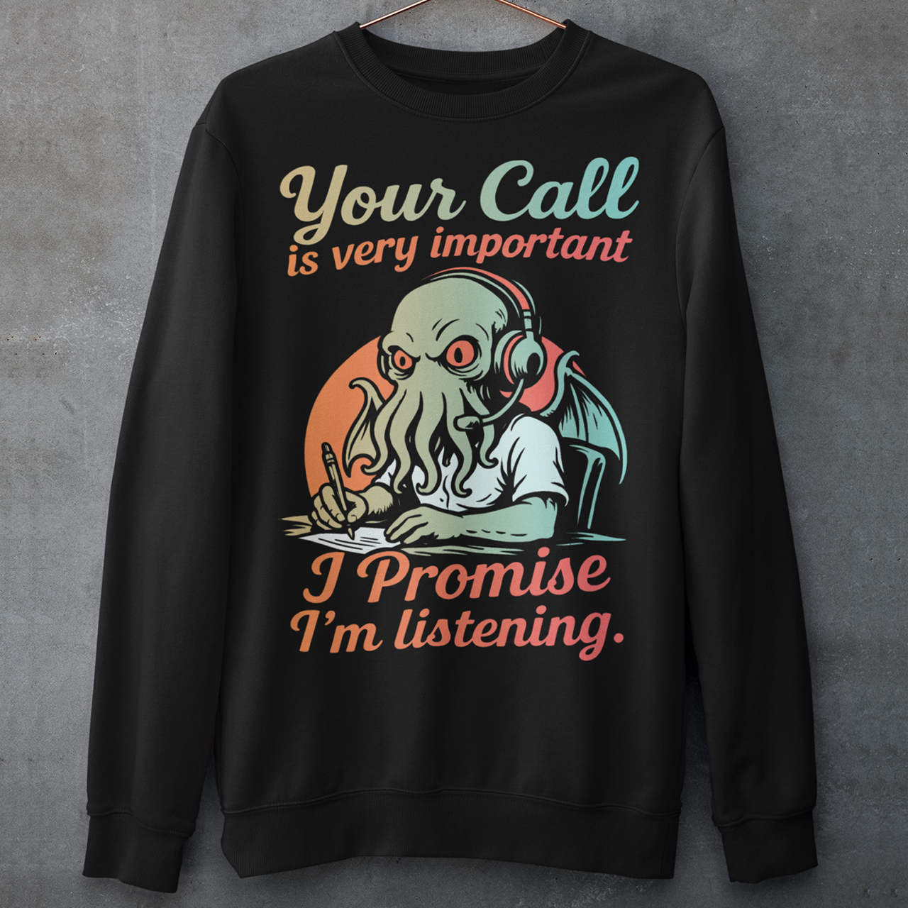 This sweatshirt drops Cthulhu into the fluorescent glow of a call centre desk, headset perched, tentacles multitasking like a cosmic customer-service pro. The vintage colors and playful lettering give it a warm, retro hum while the great old one pretends to take notes. It’s a perfect pick for anyone who has survived hold music, worships dark humor, or simply enjoys mythic chaos wrapped in office casual.