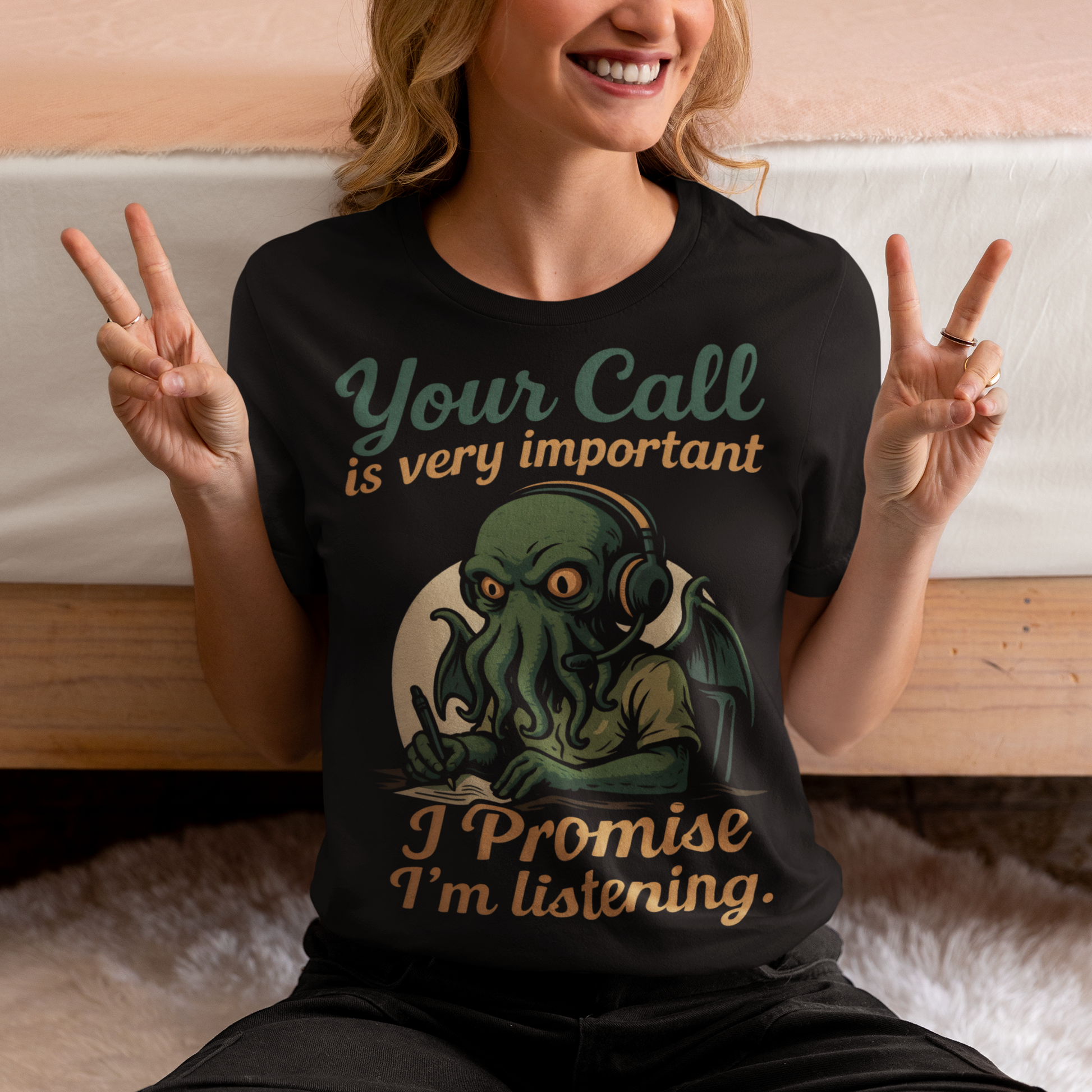 This tee drops Cthulhu into the fluorescent glow of a call center desk, headset perched, tentacles multitasking like a cosmic customer-service pro. The vintage colors and playful lettering give it a warm, retro hum while the great old one pretends to take notes. It’s a perfect pick for anyone who has survived hold music, worships dark humor, or simply enjoys mythic chaos wrapped in office casual.