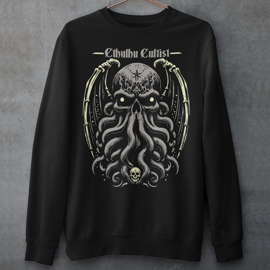 Unleash your dark allegiance with this bold graphic tee featuring a haunting skull-faced Cthulhu design. Tentacles twist and coil beneath a menacing skeletal visage, merging death and madness in one unforgettable image. Above the ancient cosmic horror, the words “Cthulhu Cultist” loom in eldritch-style lettering, marking you as a devoted follower of the Great Old One. Perfect for fans of Lovecraftian horror, dark fantasy, or anyone drawn to the mysterious depths of the unknown.