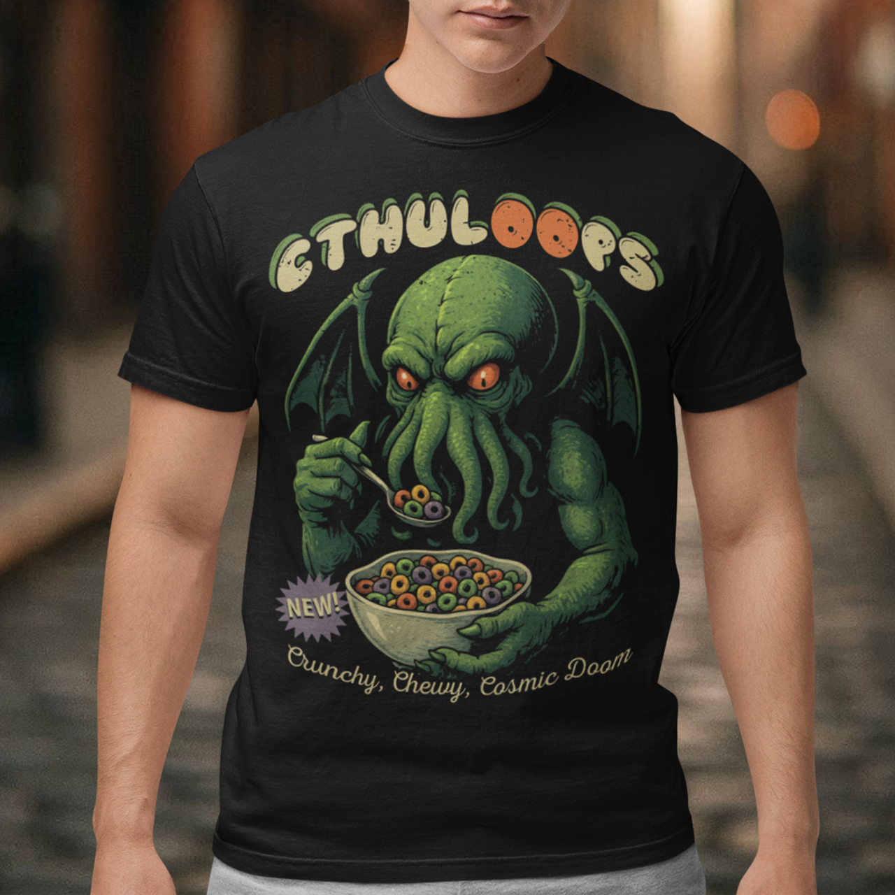 Start your mornings with a cosmic crunch! This t-shirt features a playful yet menacing design of Cthulhu casually enjoying a bowl of cereal, with the bold text “CTHULOOPS” splashed across the front. Equal parts creepy and hilarious, it’s a mashup of Lovecraftian horror and Saturday morning cartoons. This shirt is perfect for fans of cosmic horror, quirky humor, and breakfast that drives you mad.