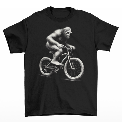 Black t-shirt of Bigfoot cycling a bike.