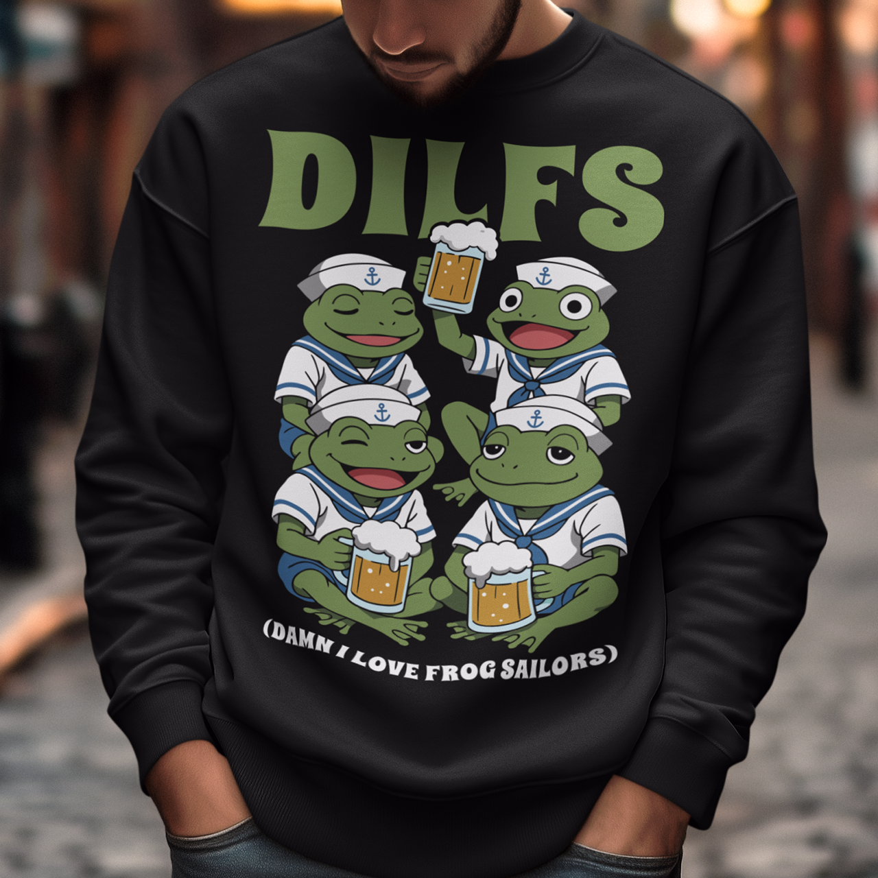 Black sweatshirt featuring a humorous cartoon design of four green frogs dressed as sailors, each wearing a white navy uniform and hat with anchor symbols. The frogs are smiling and holding mugs of beer, with one raising a drink in a toast. Large green text at the top reads “DILFS,” and smaller text below says “Damn I Love Frog Sailors,” creating a playful and funny nautical-themed graphic.