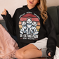 Black hoodie of three Dire Wolves sitting in front of a retro sun with text below DE-EXTINCTION.