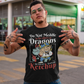 Black t-shirt of a dragon holding a bottle of ketchup standing behind a viking  with text DO NOT MEDDLE IN THE AFFAIRS OF DRAGONS FOR YOU ARE GOOD WITH KETCHUP.