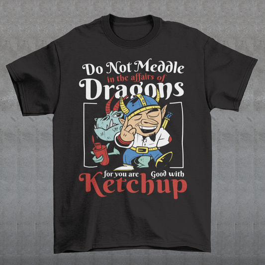 Introducing our whimsically fierce and flavorful "Dragon Connoisseur" T-shirt! This eye-catching design features a majestic dragon with a mischievous grin, proudly holding a bottle of ketchup, standing ominously behind a brave Viking. The caption, "DO NOT MEDDLE IN THE AFFAIRS OF DRAGONS FOR YOU ARE GOOD WITH KETCHUP," adds a touch of humor and a warning to all who dare to challenge the fiery and saucy taste preferences of these mythical creatures.