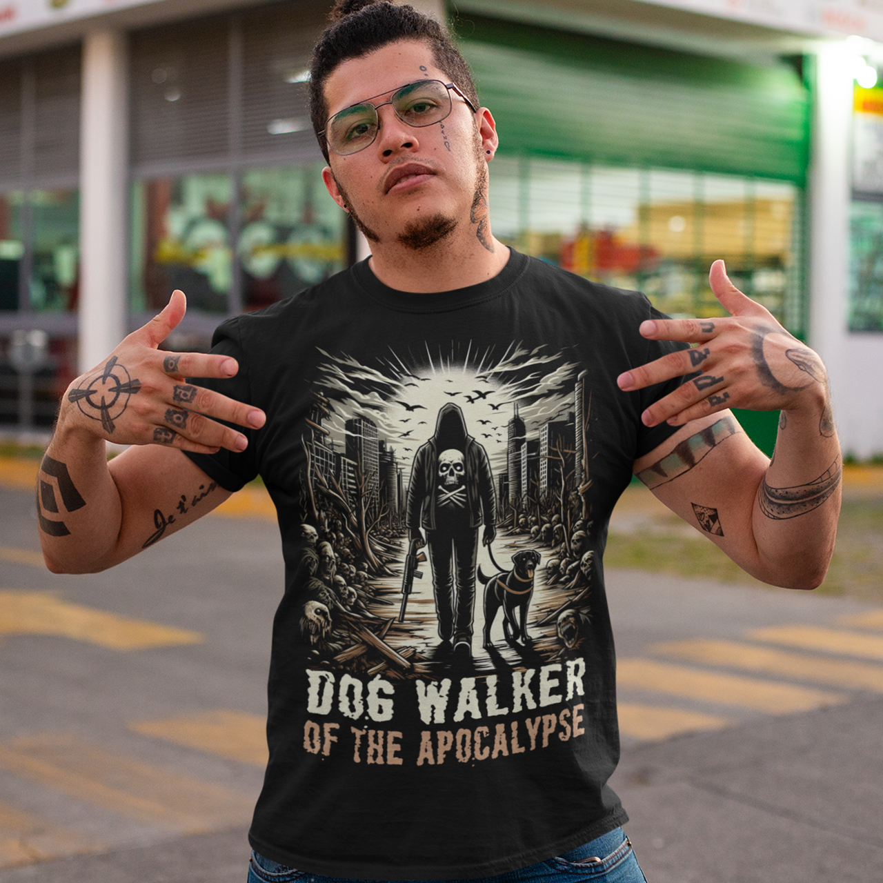 Black t-shirt of a hooded person walking a dog in the apocalypse with text below DOG WALKER OF THE APOCALYPSE.