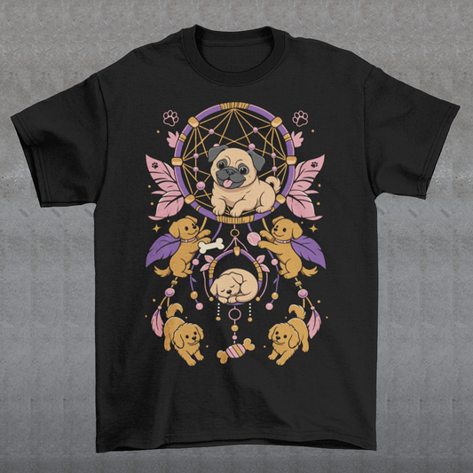 Black t-shirt featuring a colorful boho dog dream catcher design filled with adorable pug puppies. The artwork includes a central pug surrounded by smaller dogs, feathers, beads, paw prints, dog bones, and a sleeping puppy, creating a playful and whimsical pet-themed graphic. Perfect for pug lovers, dog moms, puppy enthusiasts, and fans of cute bohemian dog apparel.