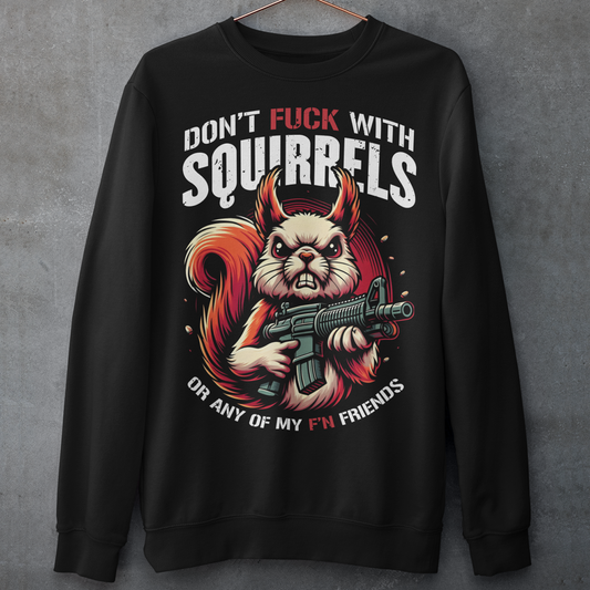 Black sweatshirt of a squirrel with a gun with text above "DON'T FUCK WITH SQUIRRELS" and text below "OR ANY OF MY F'N FRIENDS".